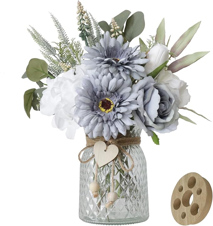 Leftover Fake Flowers in Vase by LEFTOVER